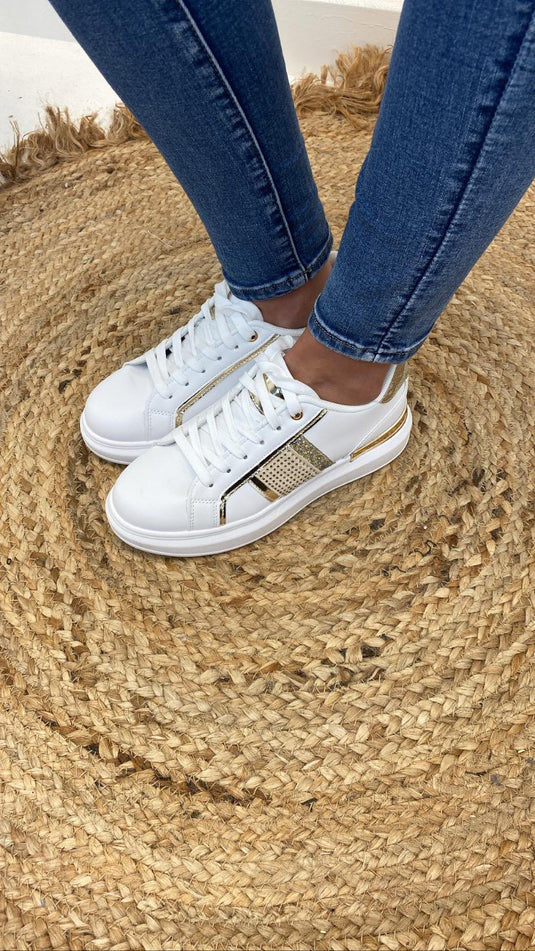 Ellie White/Gold Trainer